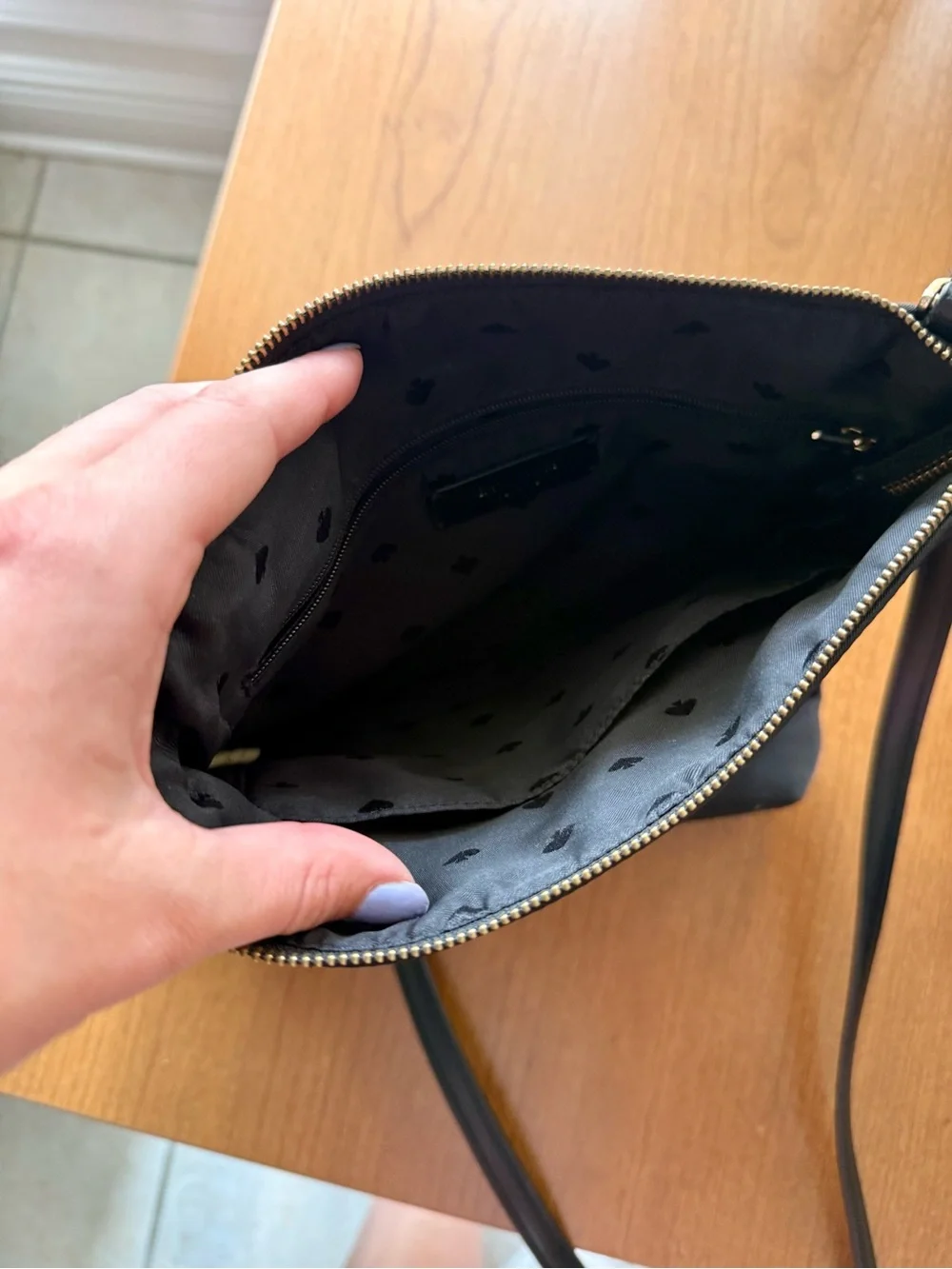 Kate Spade black crossbody bag with gold hardware